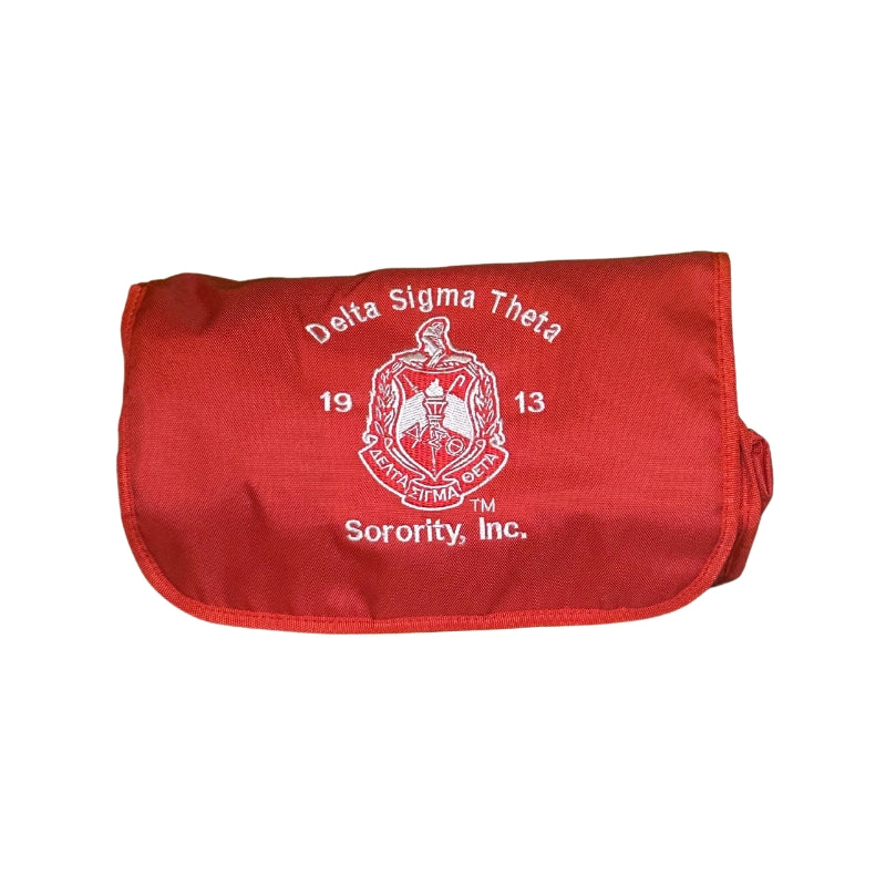 Red toiletry bag with Delta Sigma Theta Sorority, Inc. logo.  front view with embroidered crest
